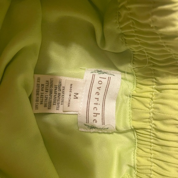 Woman’s bright neon green workout shorts - Picture 2 of 6